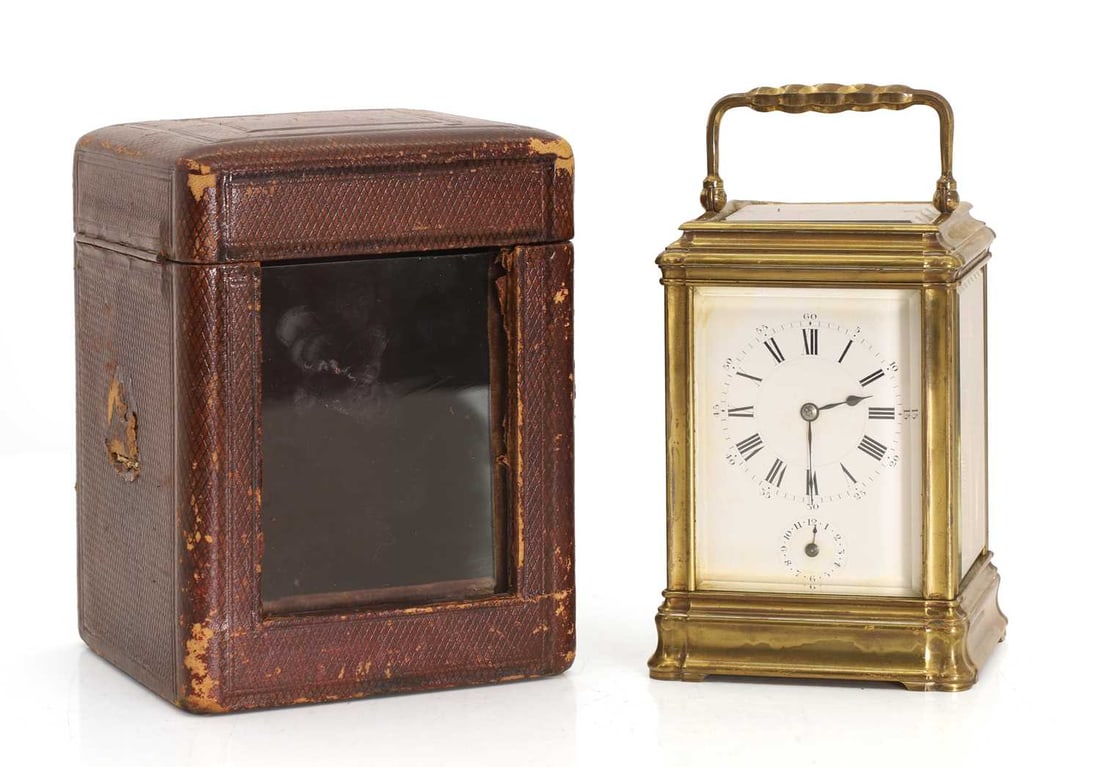 A cased carriage alarm clock, late 19th century,: A cased carriage alarm clock, late 19th century, the bell strike movement faced by a white Roman dial, above a secondary arabic numeral hour setting dial, marked H J Paris to movement