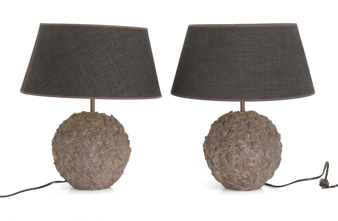 A pair of table lamps, of recent manufacture,: A pair of table lamps, of recent manufacture, the spherical bases are decorated with acorns and acorn leaves, with a woven blue lamp shades Bases, 22cm wide, 33cm high 2