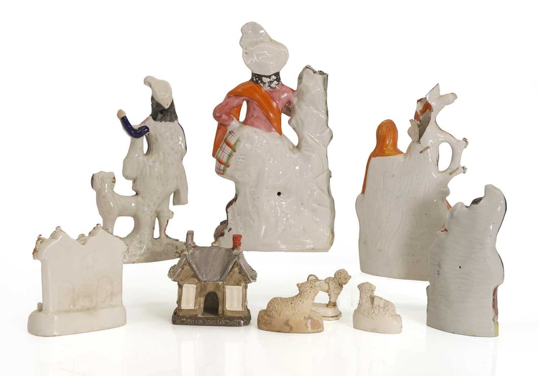 Nine Staffordshire pastille burners and various figures, 19th century, - 2