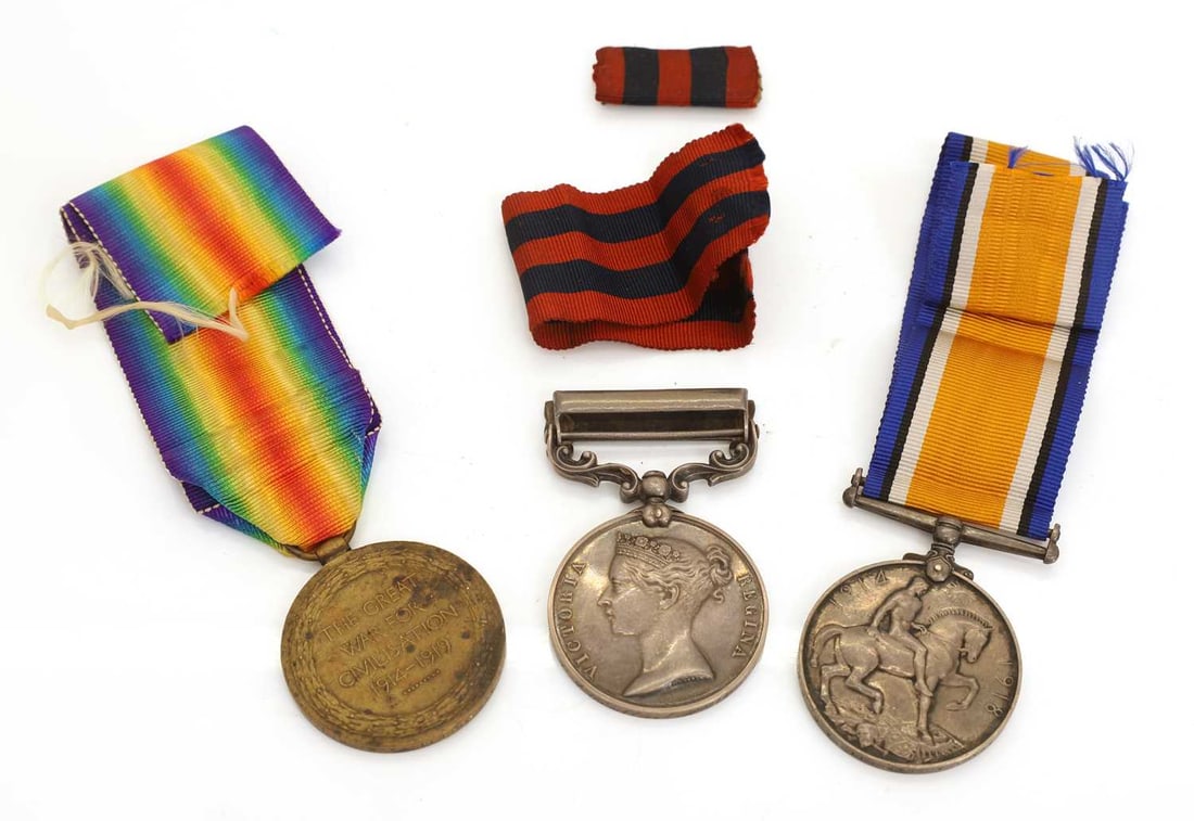 A collection of three medals, - 2