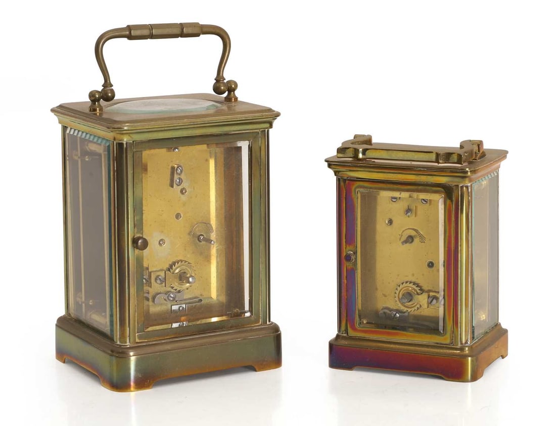 A brass carriage clock, in a travelling case, and another - 2