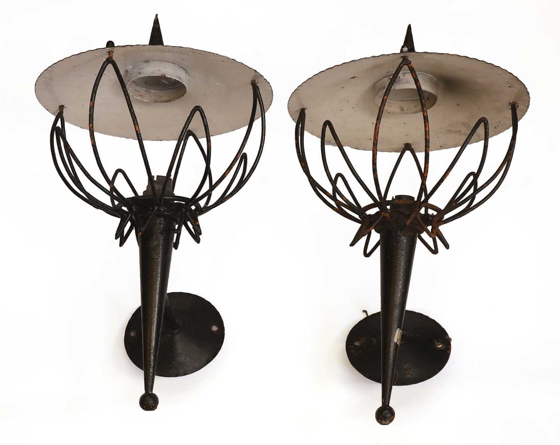 A pair of black painted steel wall lights, mid 20th century,: A pair of black painted steel wall lights, mid 20th century, continental, painted in black over a previous orange finish, with bayonet bulb fitting 26cm wide, 50cm high 2 Condition Report: Corrosion