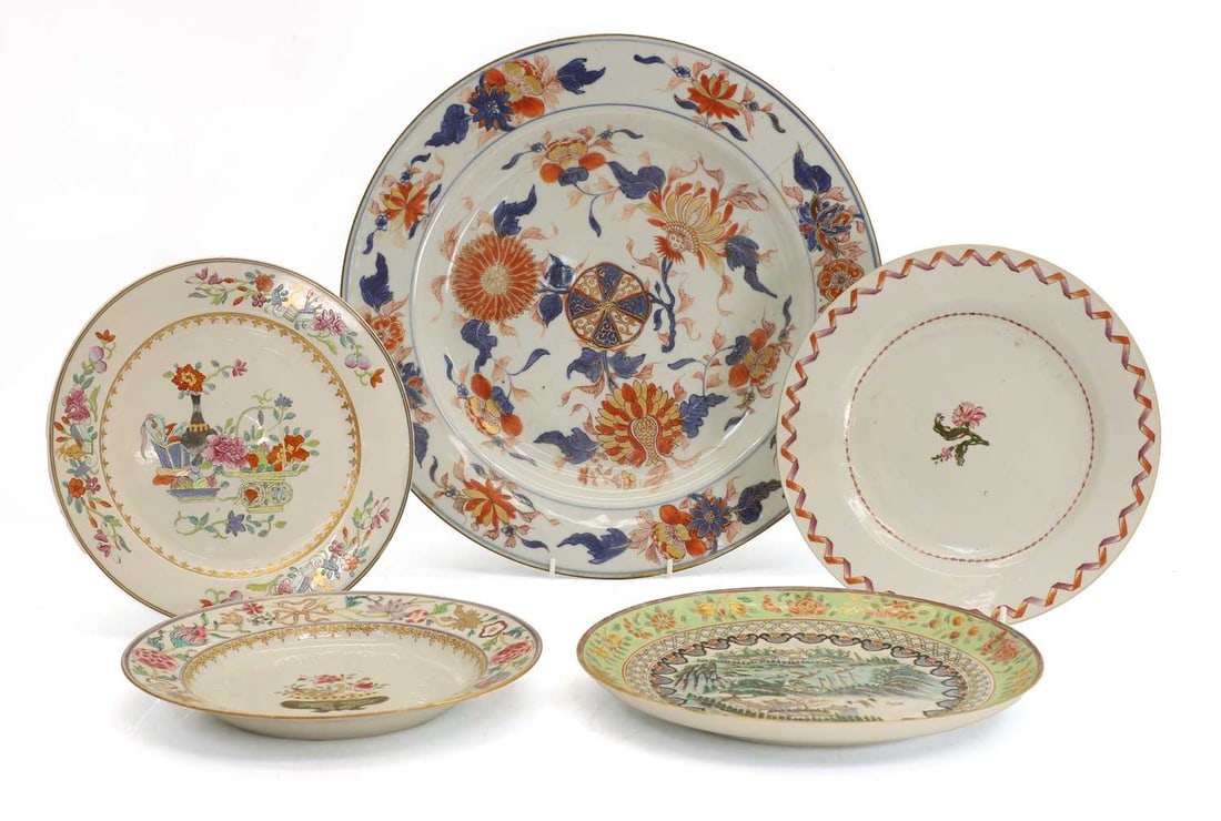 A large Chinese Imari charger, 18th century,: A large Chinese Imari charger, 18th century, painted in underglaze blue, with overglaze iron-red and gilt, and three further Chinese plates, 18th-19th century, one painted with a mountainous river sce