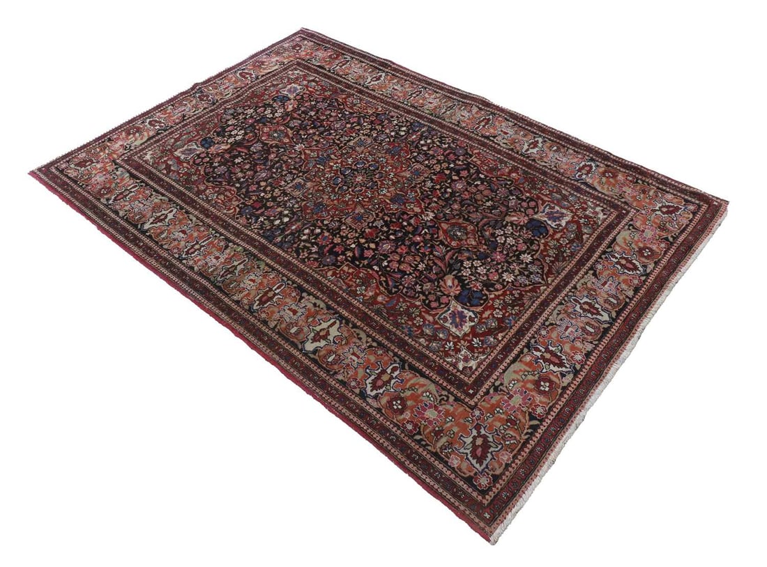 A Persian rug, (1 of 2)