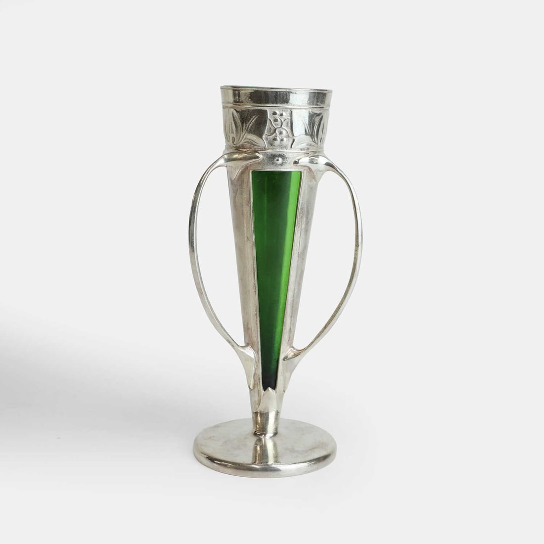 Archibald Knox (British, 1864-1933) for Liberty & Co., a Tudric vase,: Archibald Knox (British, 1864-1933) for Liberty & Co., a Tudric vase, circa 1900, of conical form, the upper band decorated with stylised flowers, with three handles, raised on a circular base, with