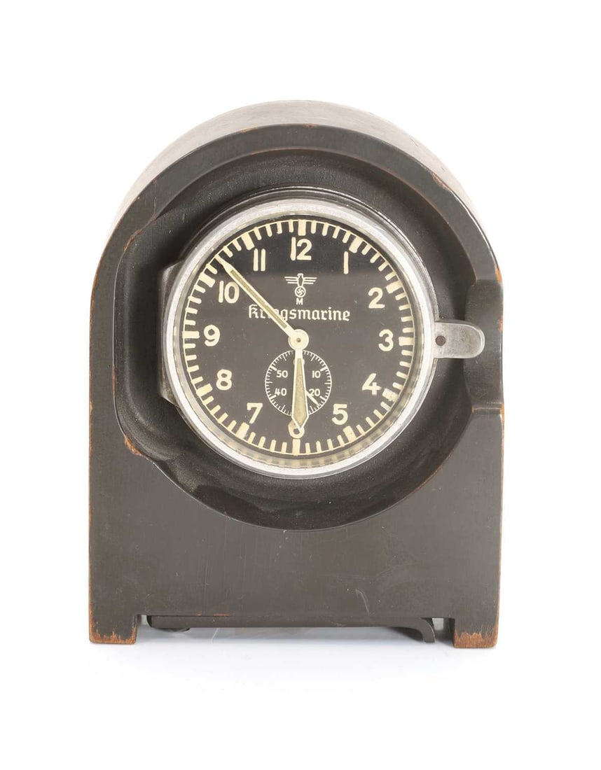 A WWII Kriegsmarine bulkhead clock, by Junghans, - 2