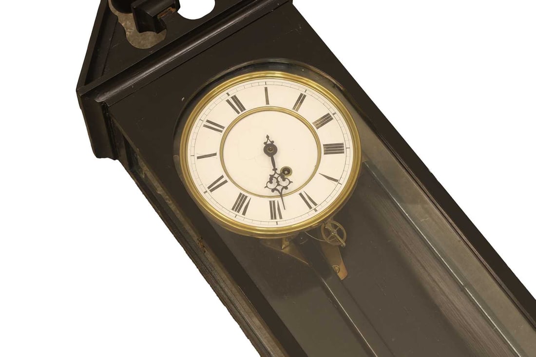 An ebonised wall clock, - 2