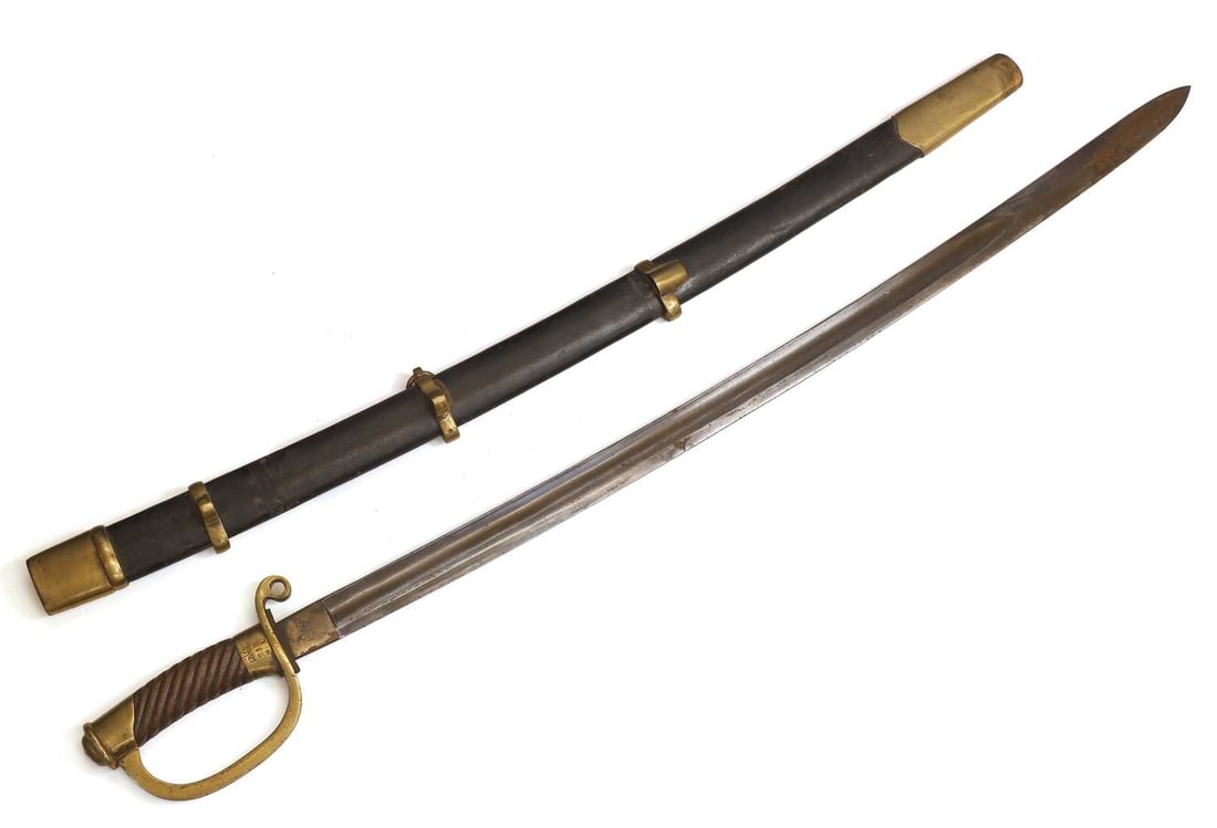A Russian Dragoon (Shashka) sabre, 1881 pattern, blade dated 1908,: A Russian Dragoon (Shashka) sabre, 1881 pattern, blade dated 1908, the spiral wood handle, with a brass hilt with pierced scroll, stamped, 'Zlat.Or.Fabr 1908G' opposite '13KIII 213 H L', the blade sta