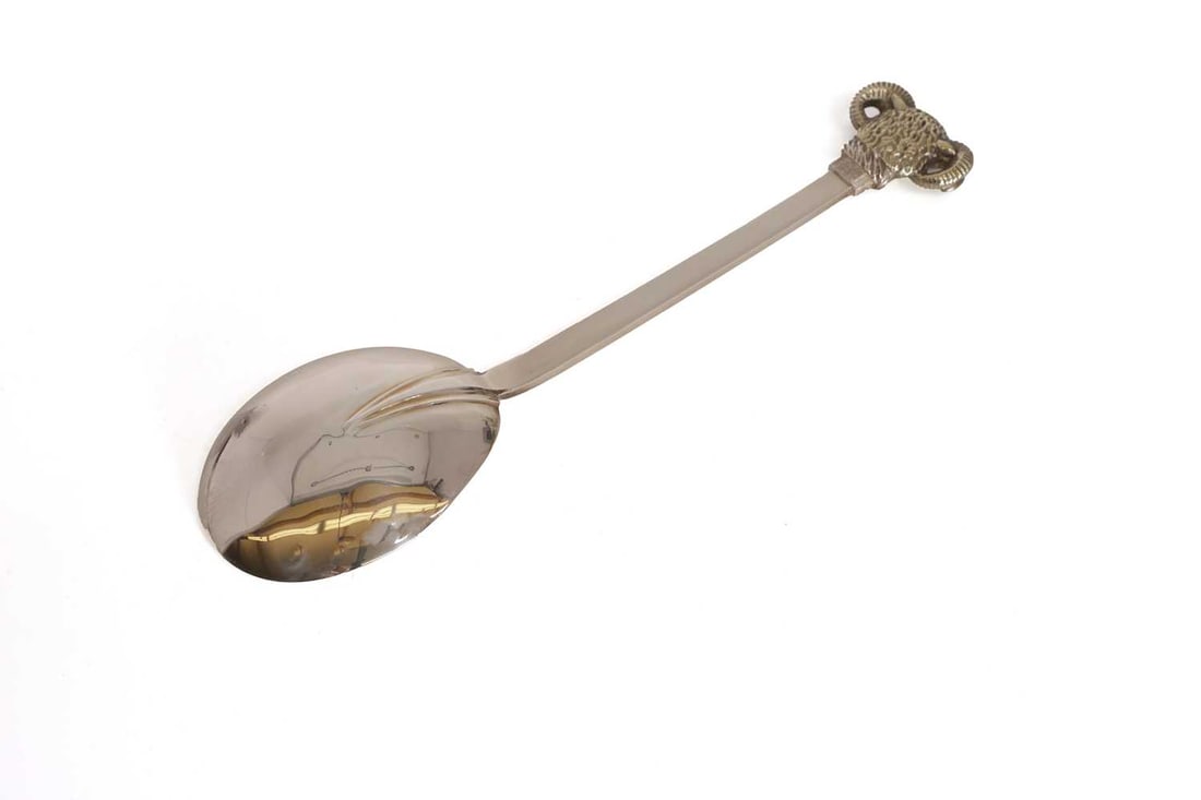 A silver commemorative Clothworkers Company presentation spoon, - 2