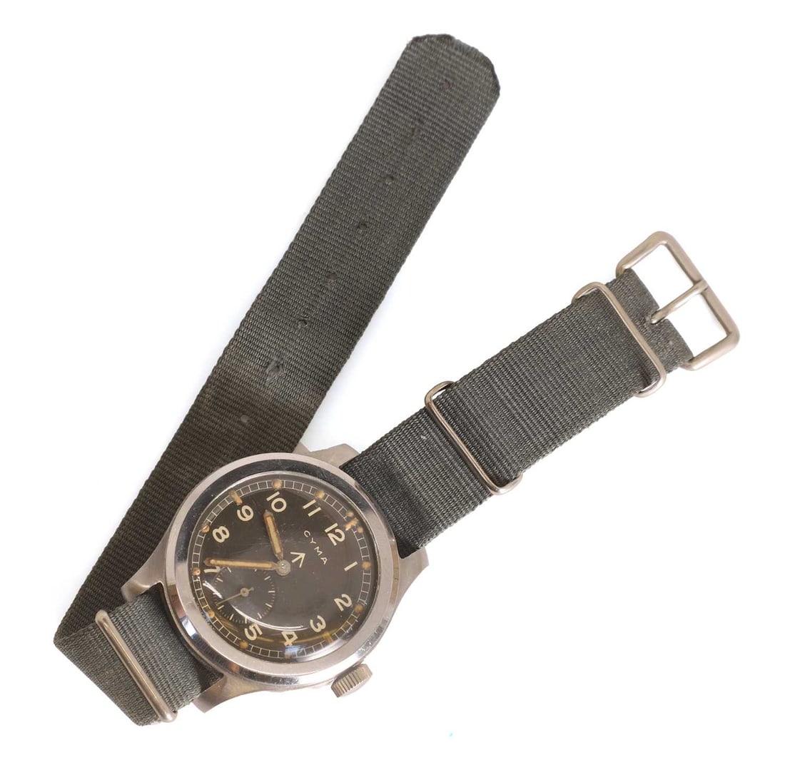 A Cyma stainless steel British military-issued ‘Dirty Dozen’ mechanical wristwatch, 1940: A Cyma stainless steel British military-issued ‘Dirty Dozen’ mechanical wristwatch, 1940s, with a hand-wound movement, 234 calibre, with a black dial with luminous Arabic numerals, signed 