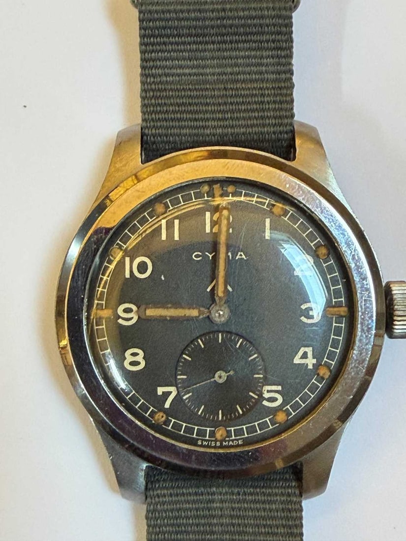 A Cyma stainless steel British military-issued ‘Dirty Dozen’ mechanical wristwatch, 1940 - 6