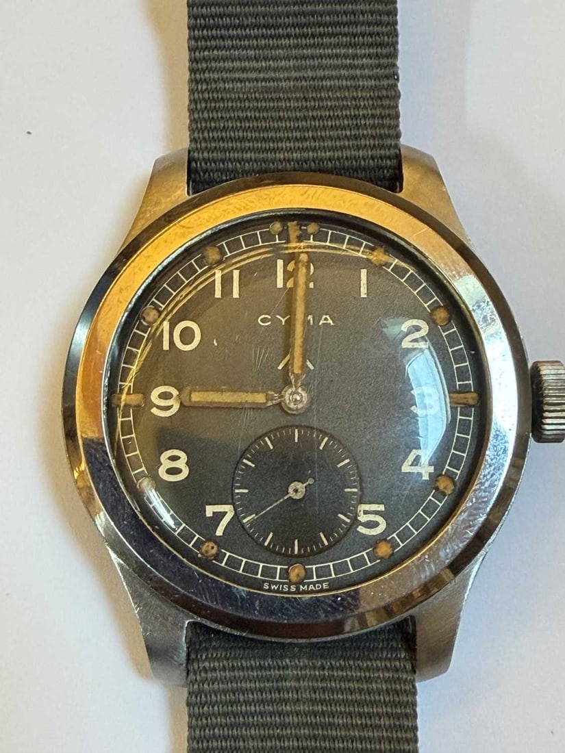 A Cyma stainless steel British military-issued ‘Dirty Dozen’ mechanical wristwatch, 1940 - 9