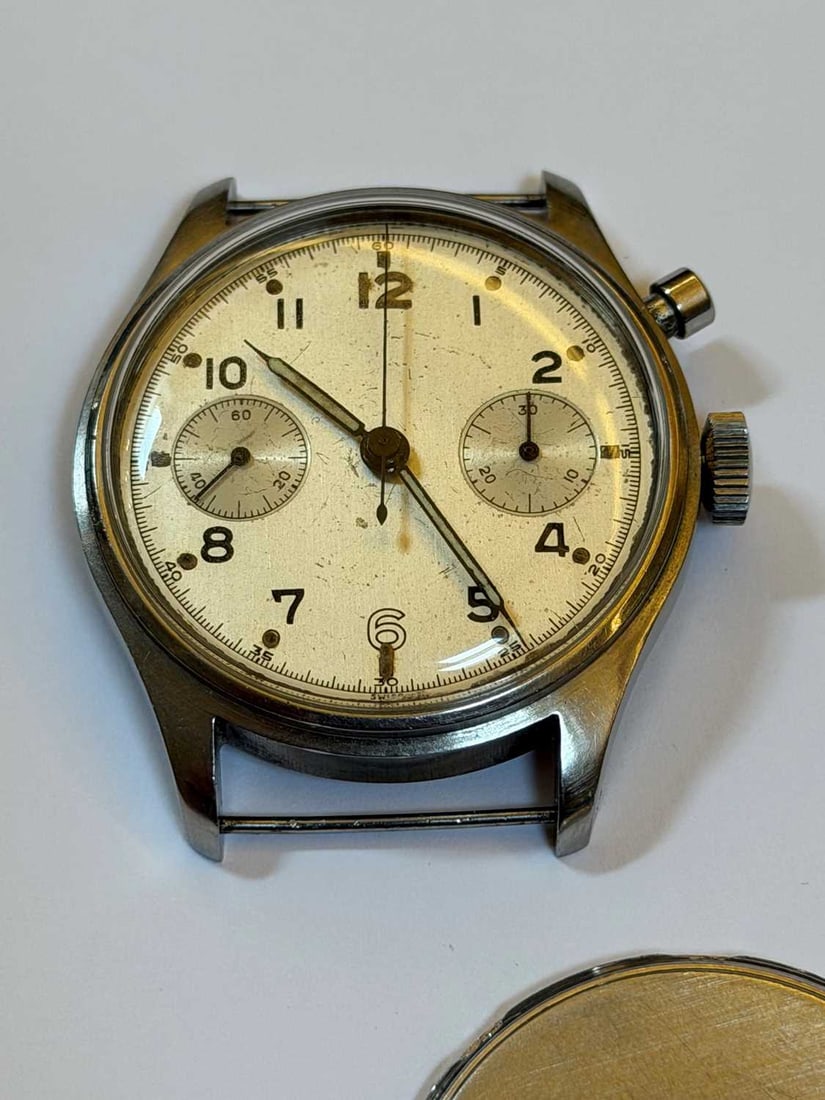 A Royal Navy issue single button chronograph stainless steel wristwatch, probably Lemania, - 6