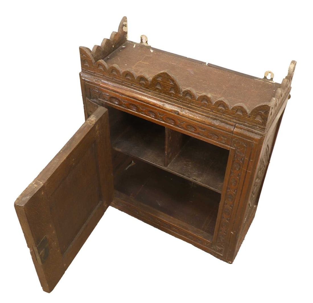 An English oak Gothic wall cupboard, 17th century and later, - 2
