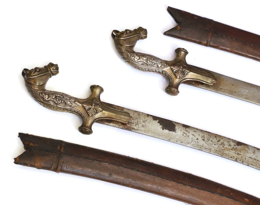A near pair of Indian talwar sabres, circa 1900, - 2