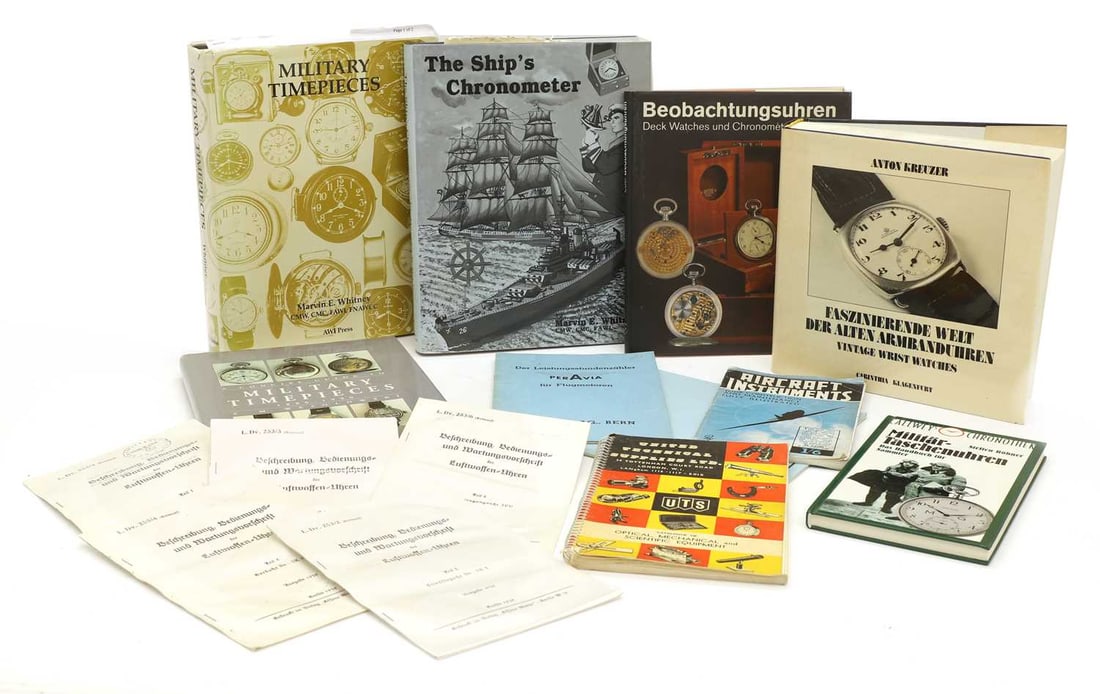 A collection of clock reference books,: A collection of clock reference books, The Ships's Chronometer, Military Timepieces, both by Marvin Whitney, three German books, and further pamphlets and photocopied German pamphlets Qty Provenance: