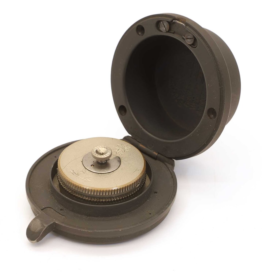 A WWII Kriegsmarine bulkhead clock, by Junghans, - 2