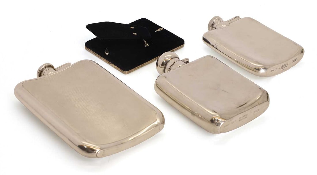 A silver and engine turned hip flask, - 2