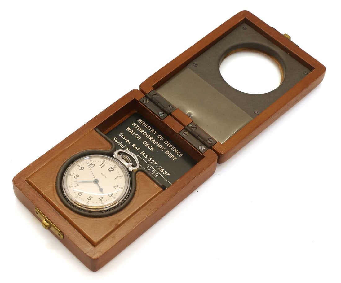 A Royal Navy chrome and nickel plated open face deck pocket watch, Elgin National Watch Company, the: A Royal Navy chrome and nickel plated open face deck pocket watch, Elgin National Watch Company, the movement by B W Raymond, top-wind, with a white dial with Arabic numerals, 21-jewel movement, seria