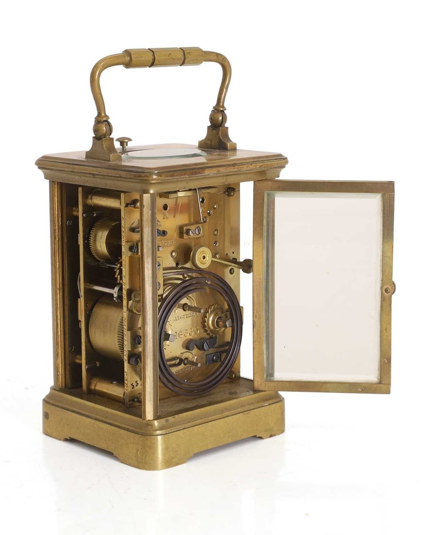 A brass repeat carriage clock, by Leroy Paris, - 2