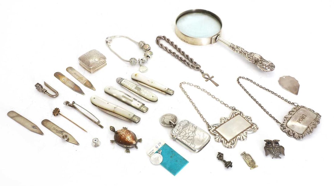 A collection of silver trinkets, (1 of 1)