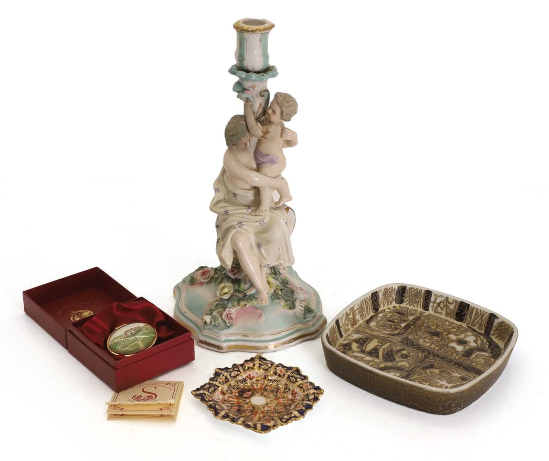 A Crown Derby dish,: A Crown Derby dish, decorated in the Imari palette, together with a Berlin porcelain candlestick, restored, a Crown Staffordshire enamel box, boxed, and a Royal Copenhagen square dish Candlestick,