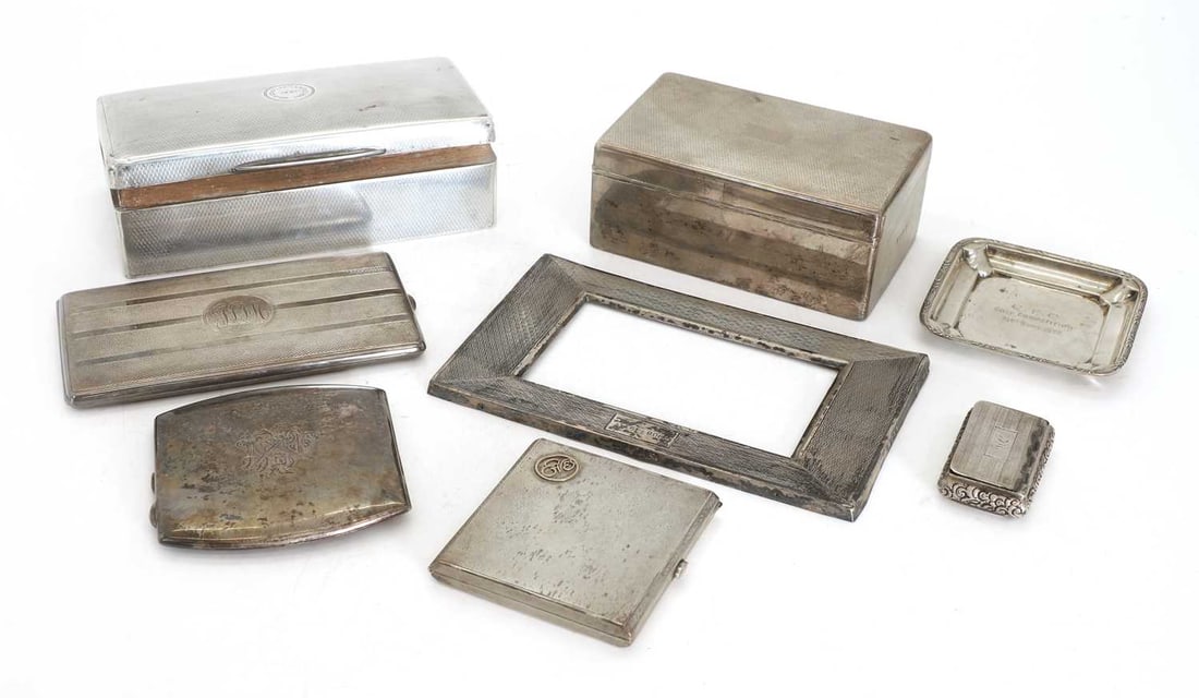 A collection of silver cigar and cigarette cases, (1 of 1)