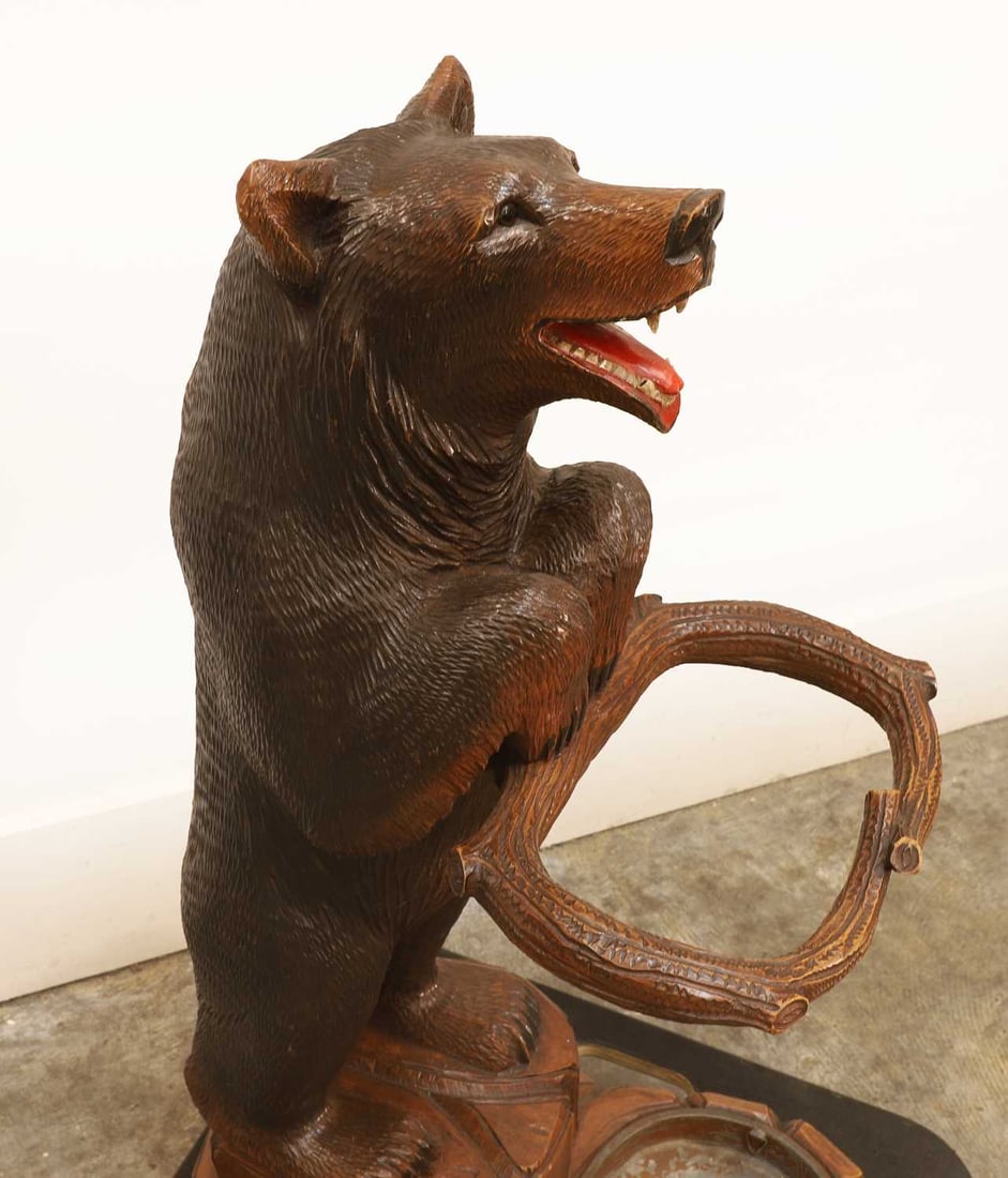 A Black Forest carved bear stick stand, late 19th century, - 2