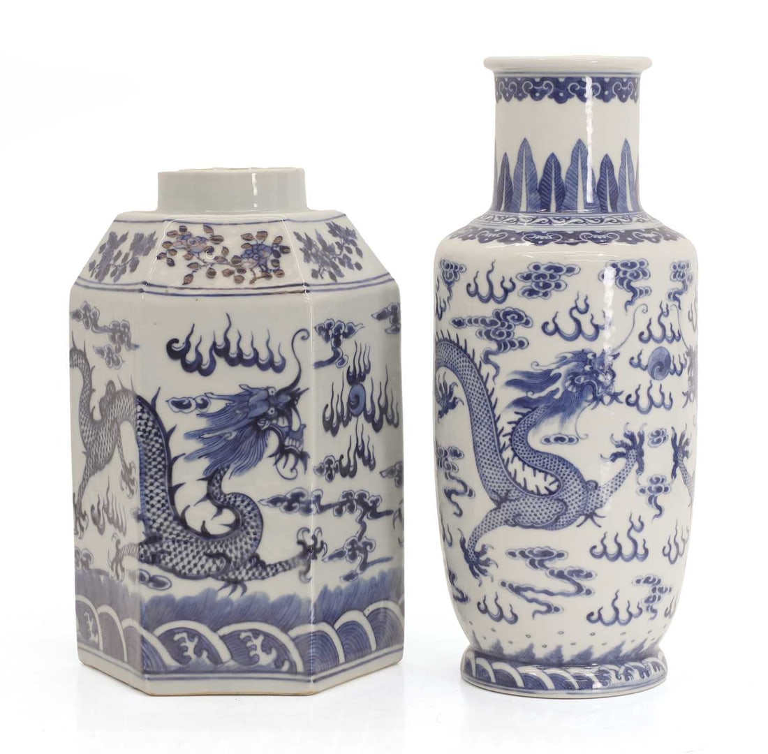 A Chinese blue and white hexagonal vase, early 20th century,: A Chinese blue and white hexagonal vase, early 20th century, decorated with two four-clawed dragons in scrolling clouds above waves, and a blue four-character mark to the base, together with another v