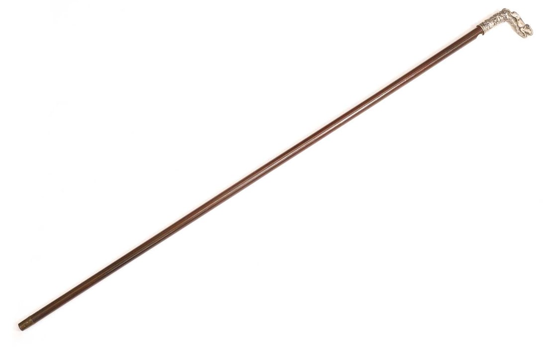 A Russian silver-mounted walking cane, late 19th century,: A Russian silver-mounted walking cane, late 19th century, the cast handle modelled with a hare being chased by hounds, 84 standard, marks rubbed, with a rosewood shaft and metal ferrule 94cm long