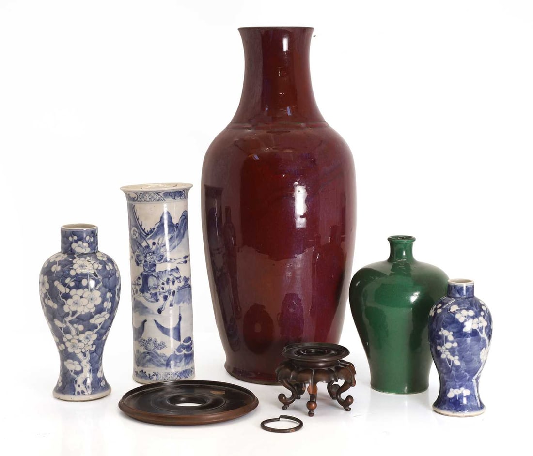 A collection of three blue and white vases, 19th century and later,: A collection of three blue and white vases, 19th century and later, two with cracked ice and blossom decoration, all with blue painted four character mark to the bases, together with a green vase
