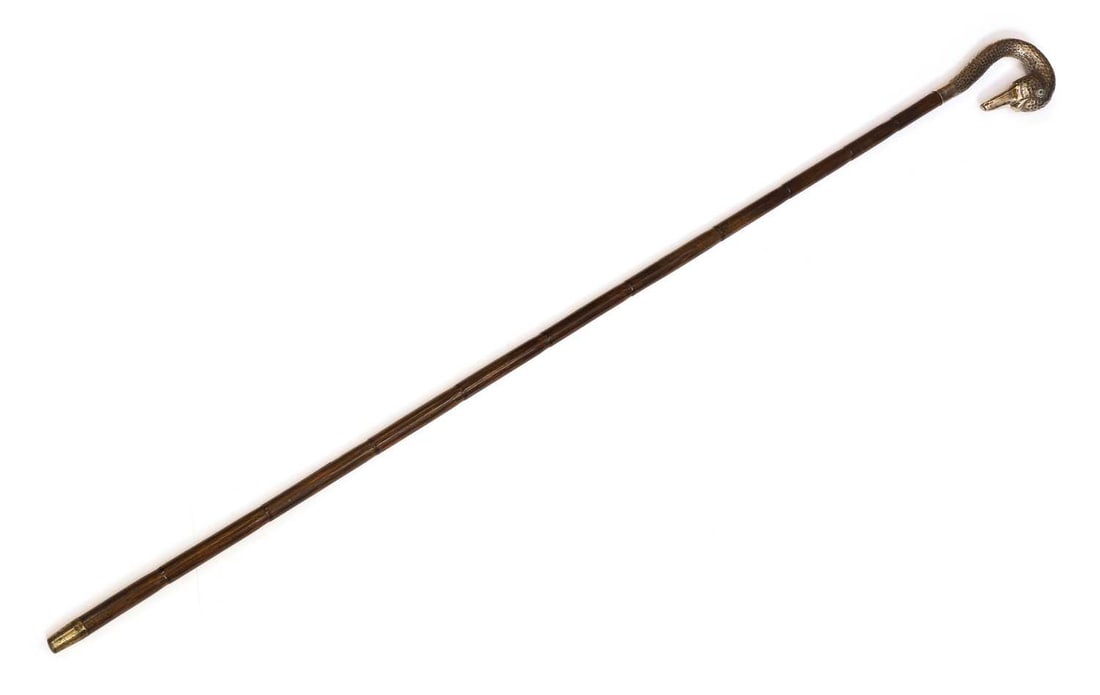 A silver-mounted swan head walking cane, makers mark CHD, London, 1902, (1 of 2)