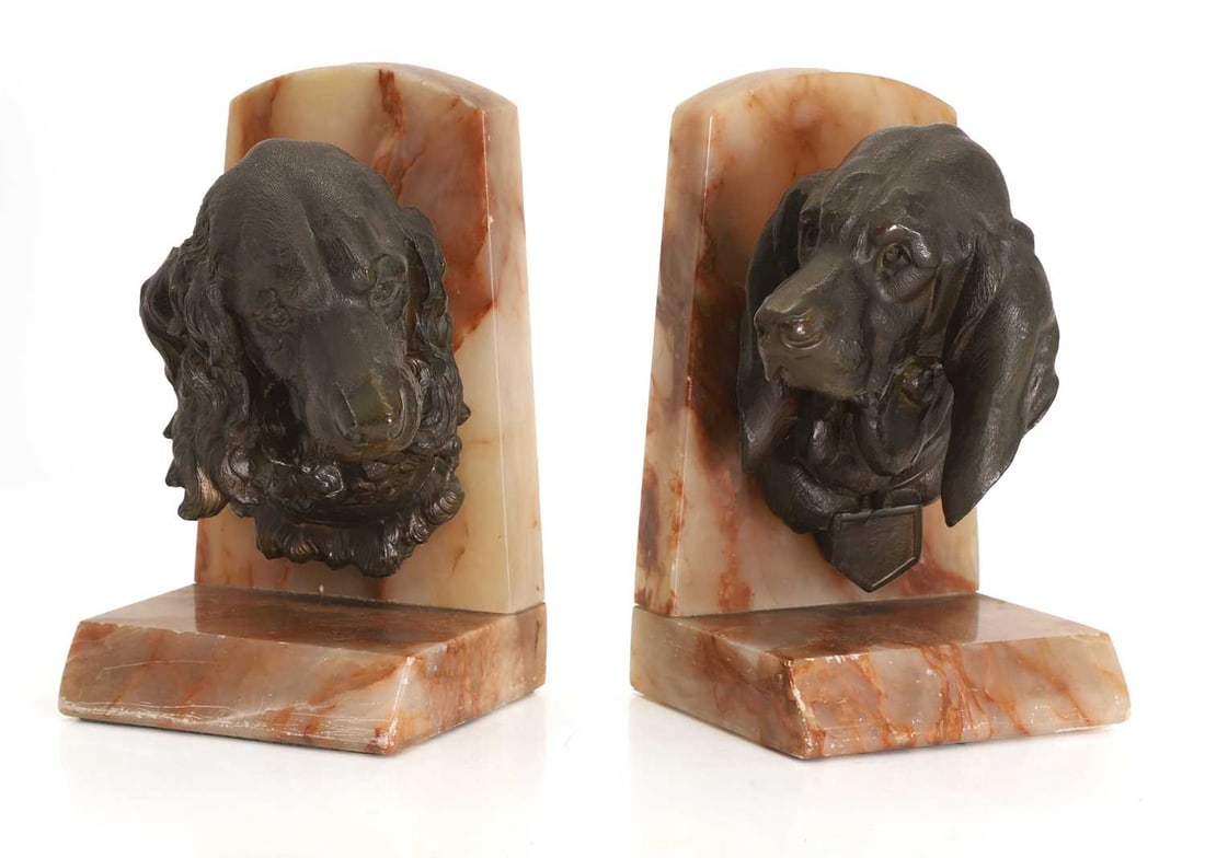 A pair of spelter and onyx bookends, 20th century, (1 of 2)