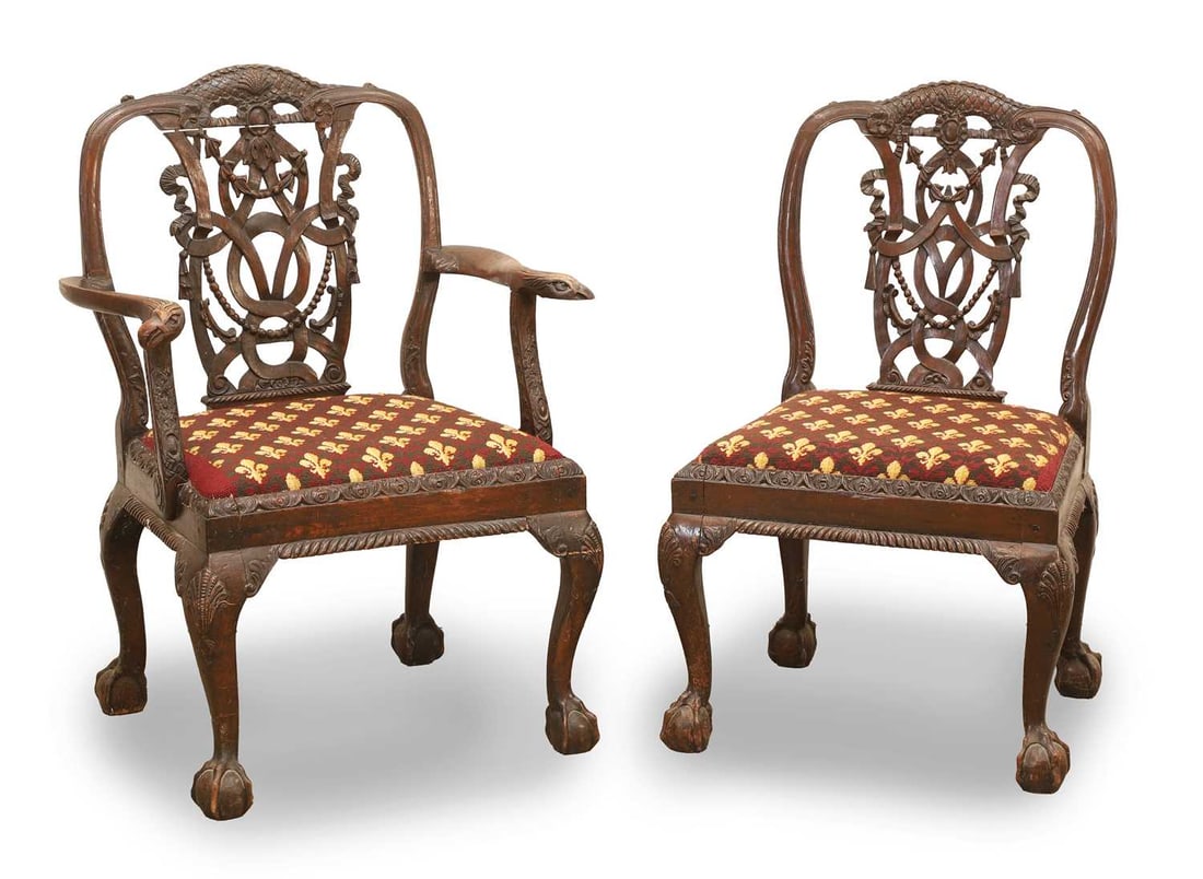 A carved elbow chair and matching side chair, 19th century, possibly American,: A carved elbow chair and matching side chair, 19th century, possibly American, the ribbon-carved splat issuing two scrolled arms with eagle head ends, raised on front cabriole support with shell