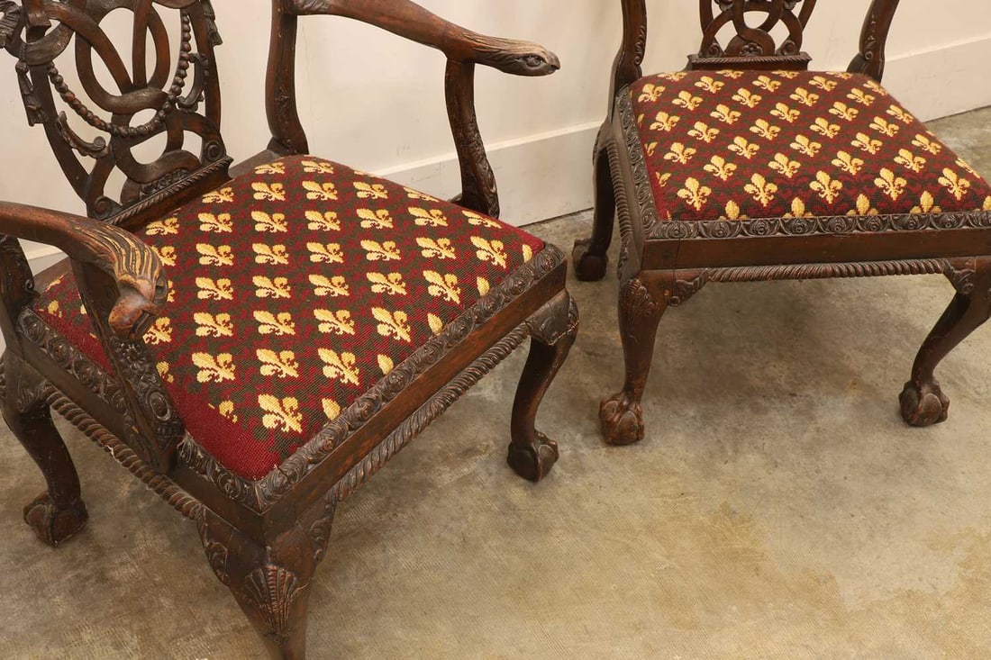A carved elbow chair and matching side chair, 19th century, possibly American, - 2