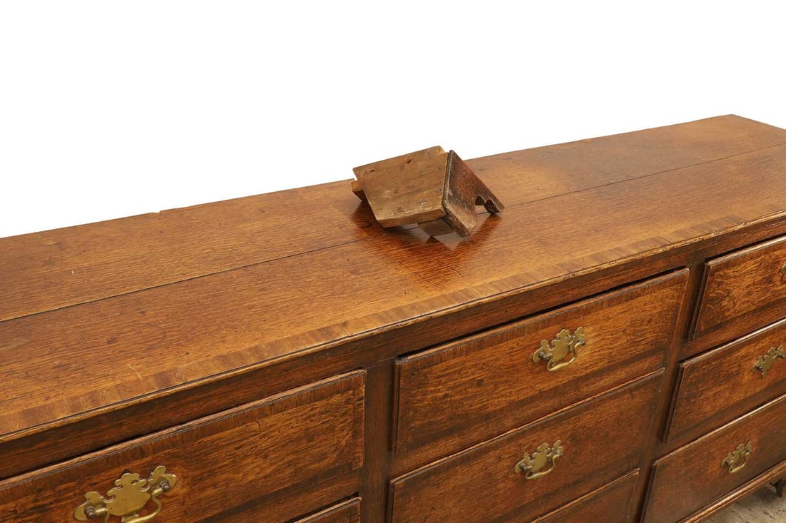 A George III oak multi drawer chest, early 19th century, - 2