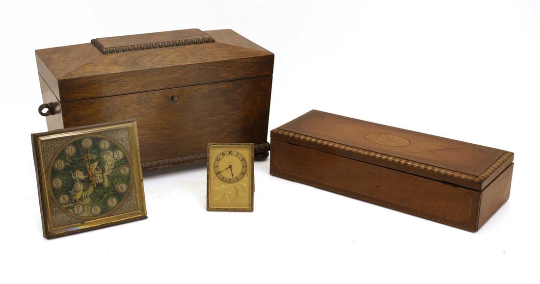A Regency rosewood tea caddy,: A Regency rosewood tea caddy, with moulded rim and base, terminating on bun feet, the interior with two compartments and associated glass liner, together with a mahogany glove box with banded details