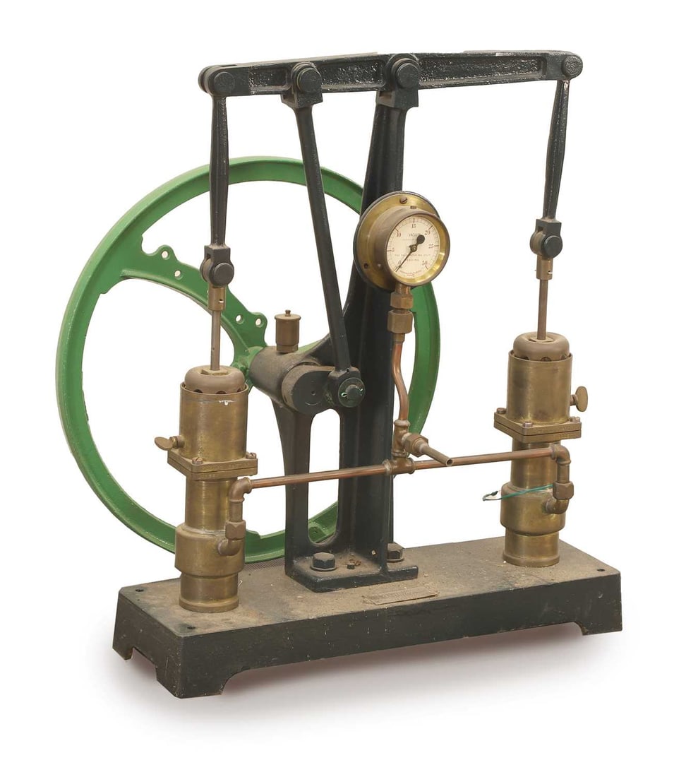 A vacuum pump,: A vacuum pump, labeled to the back 'GERYK', the wheel painted green, and with pressure gauge 53.5cm wide, 24cm deep, 65cm high Condition Report: The mechanism seems to be working and does rotate when