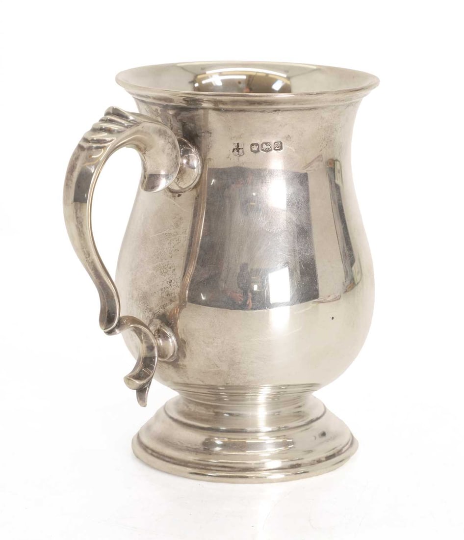 A silver tankard, - 2