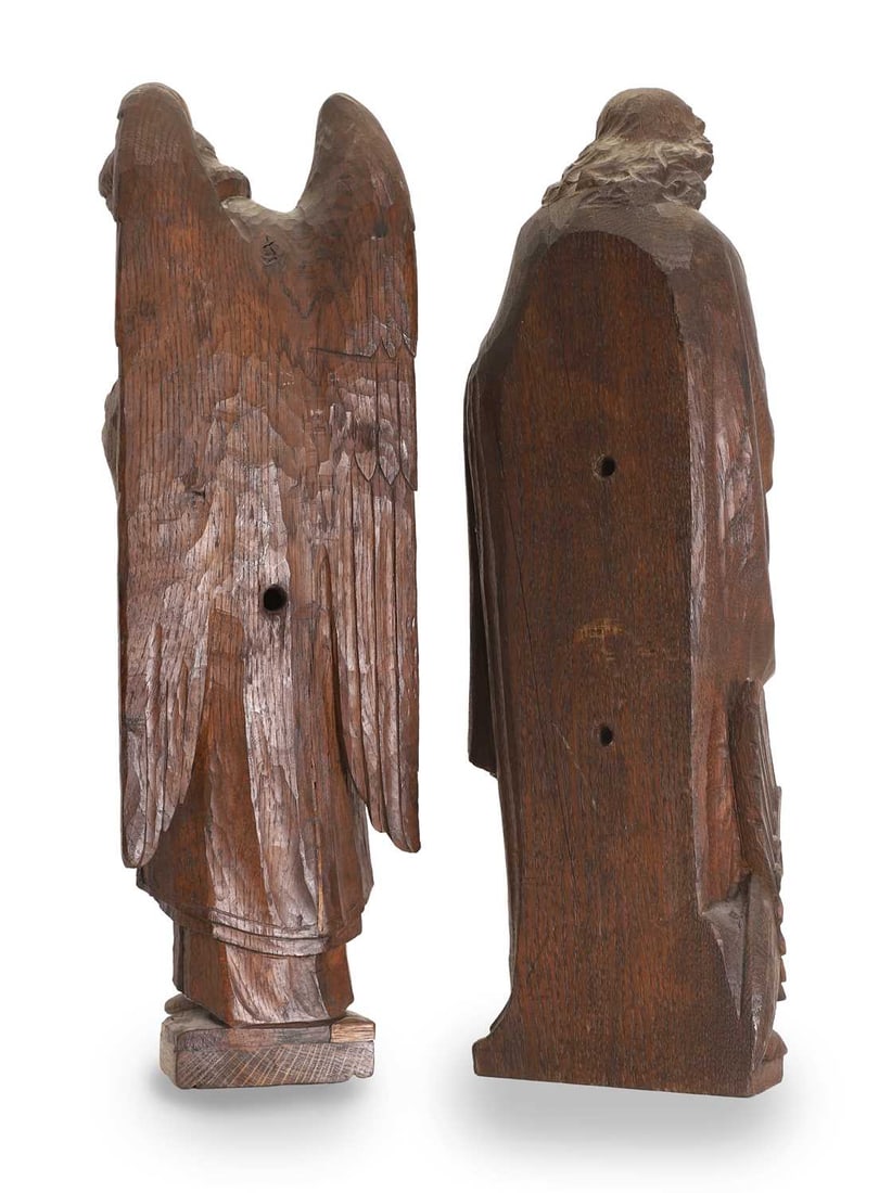 A pair of carved stained oak ecclesiastical figures. late 19th/early 20th century, - 2