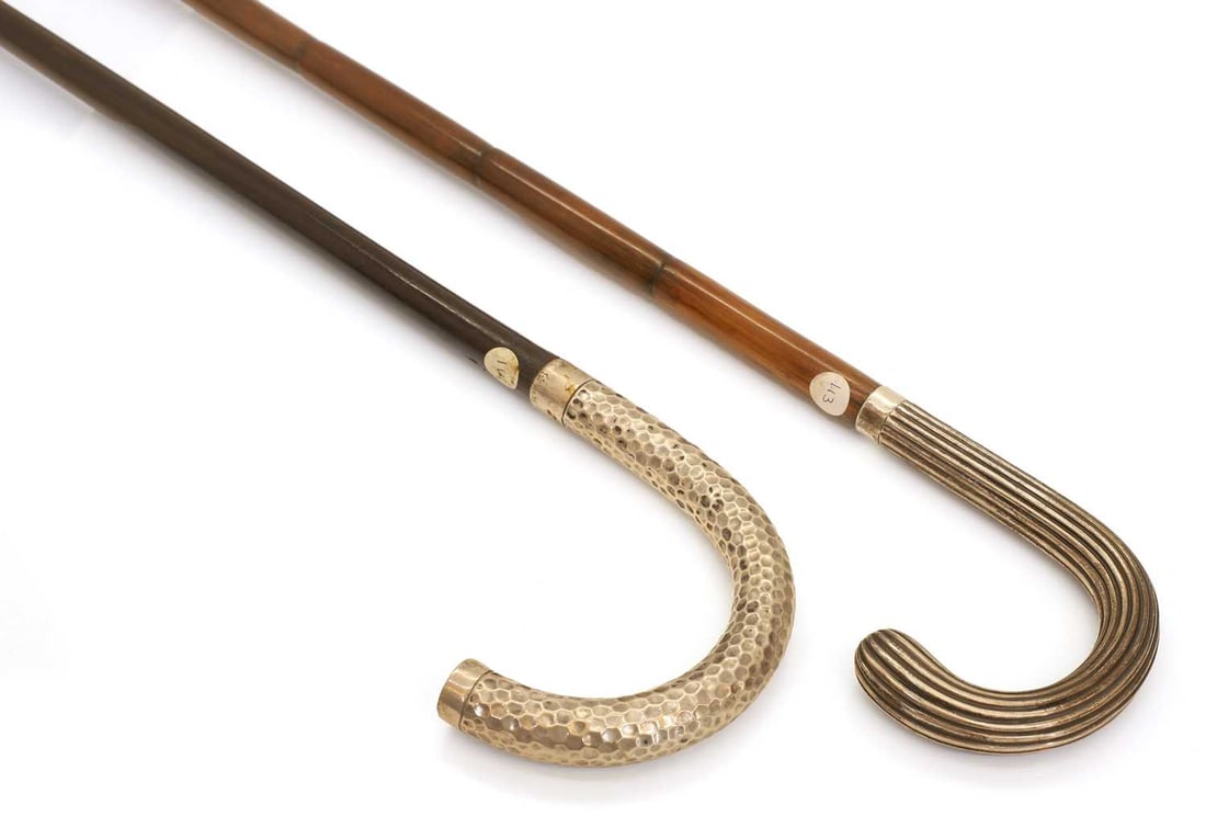 Two silver-mounted walking canes, circa 1900-10, - 2