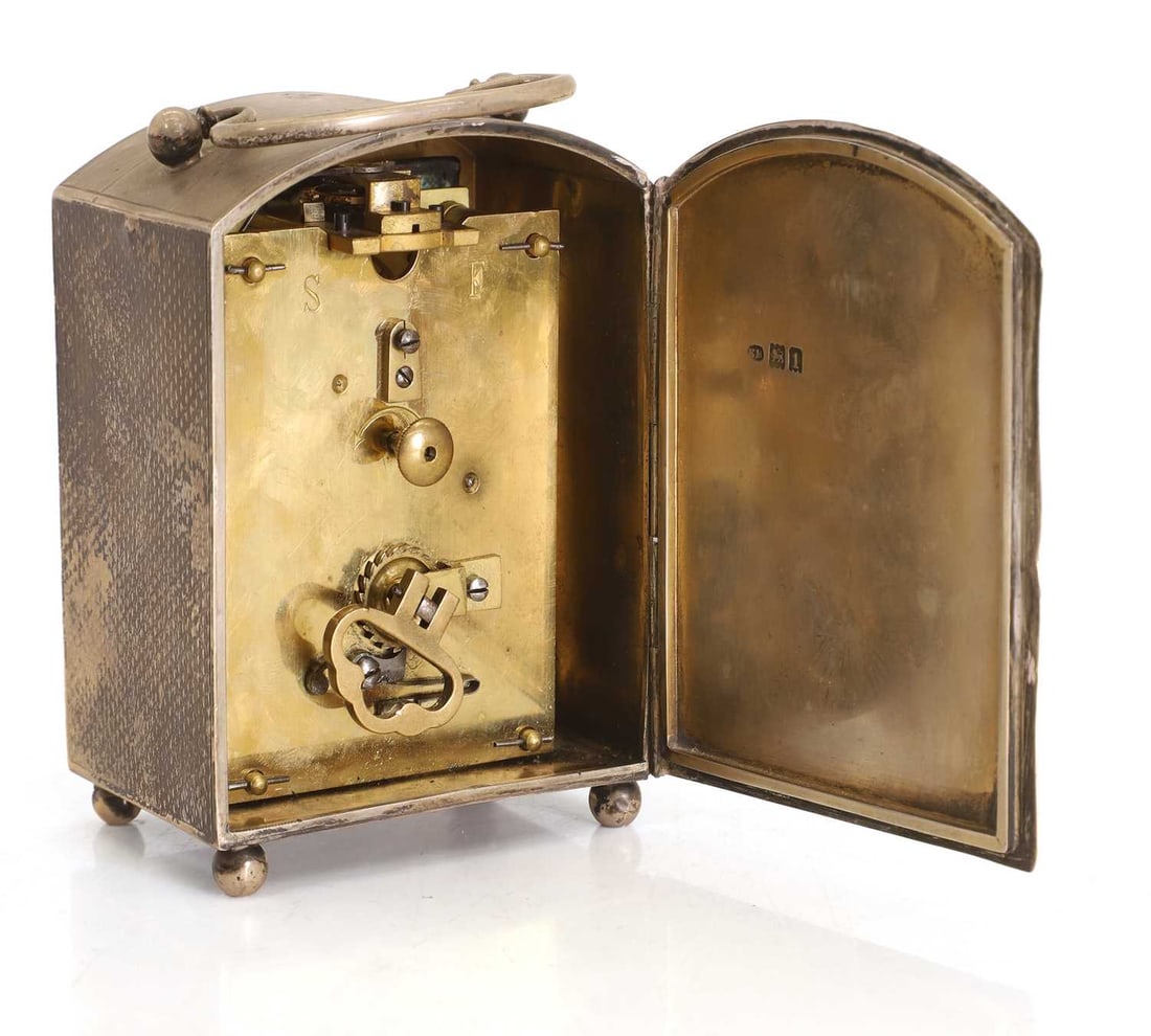 A silver table clock, 20th century, - 2