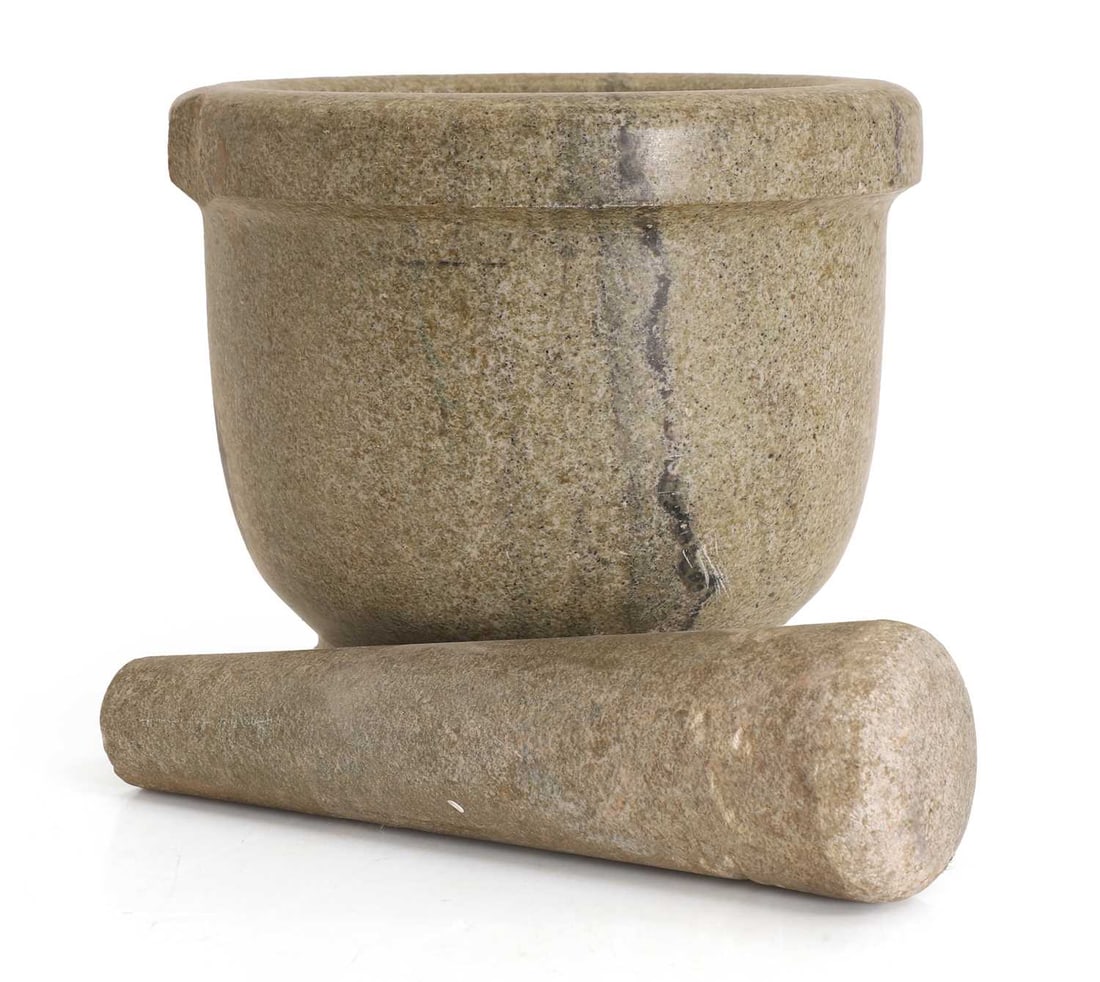 A marble mortar and pestle, late 19th/early 20th century,: A marble mortar and pestle, late 19th/early 20th century, the mortar with a waisted base; the pestle of tapering form bowl 25cm diameter, 23cm high; pestle 28cm wide Condition Report: Both with variou