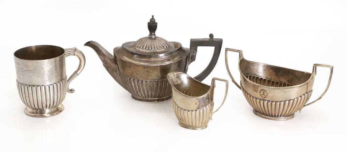 A matched three piece silver tea service, (1 of 1)
