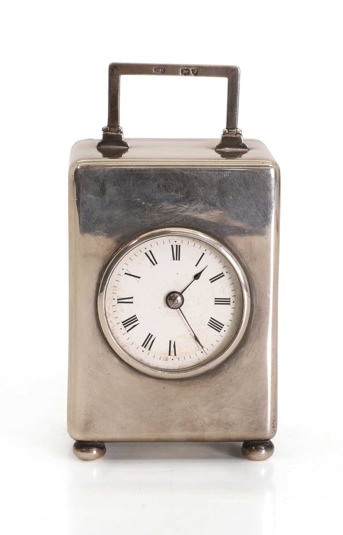 A late Victorian silver cased carriage clock, by J. Batson & Son, London, 1896,: A late Victorian silver cased carriage clock, by J. Batson & Son, London, 1896, the white enamelled Roman dial enclosed within a cuboid case, raised on squat bun feet 6.5cm wide, 5.5cm deep, 9.5cm