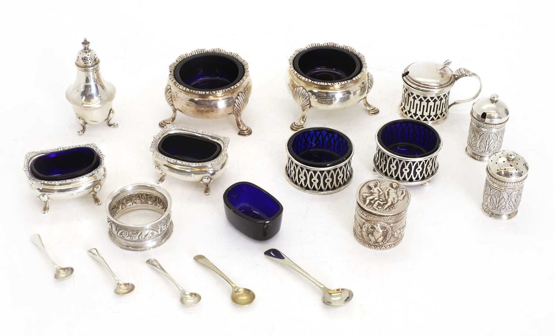 A collection of silver cruet items,