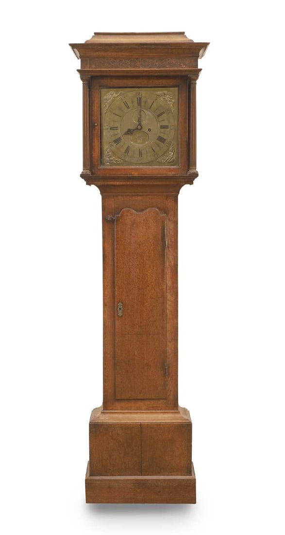 Seddon Frodsham George III oak longcase clock, 19th century,: Seddon Frodsham George III oak longcase clock, 19th century, the brass dial with Roman chapter ring and outer minute ring, with subsidiary seconds dial, the corners with moulded figural mounts 57.2m