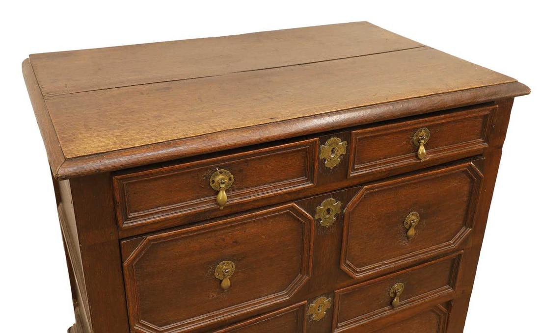 An oak geometric mould chest of four drawers, 18th century and later, - 2