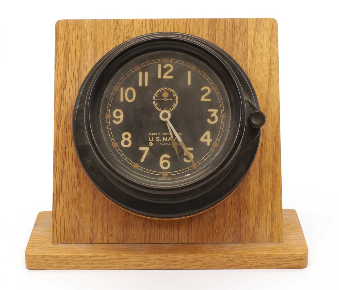 A World War II US Navy Mark I deck clock, dated 1943, by The Chelsea Clock Company, (1 of 2)