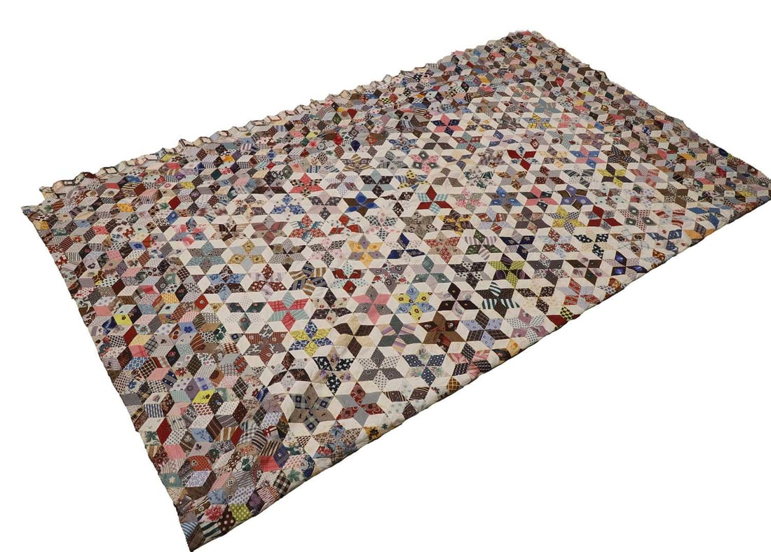 A hand-sewn patchwork quilt, 19th century, American, (1 of 2)